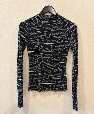 FP Movement All-Over Logo Print Mock Neck Long Sleeve Top